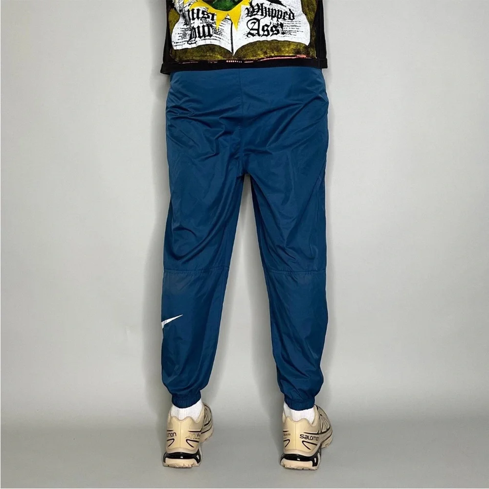 Nike Track Pants Teal Blue Polyester Joggers White Swoosh Elastic Cuffs